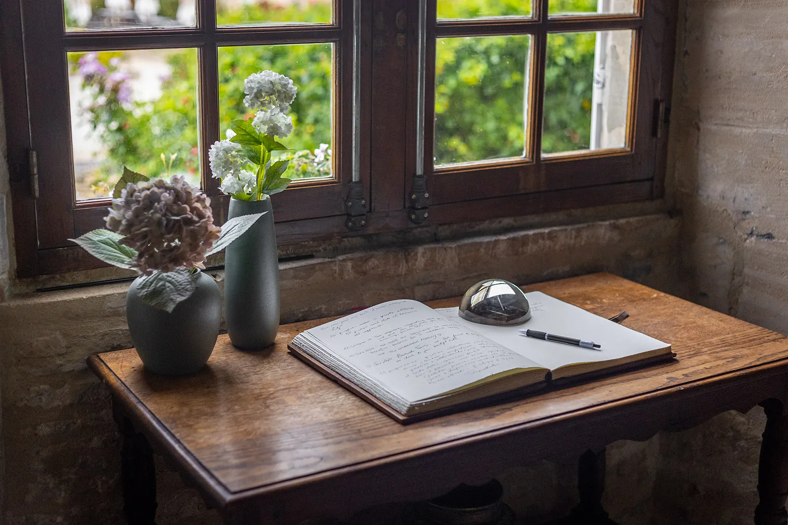 guest book at the reception of the Ferme de la Ranconniere hotel in Normandy