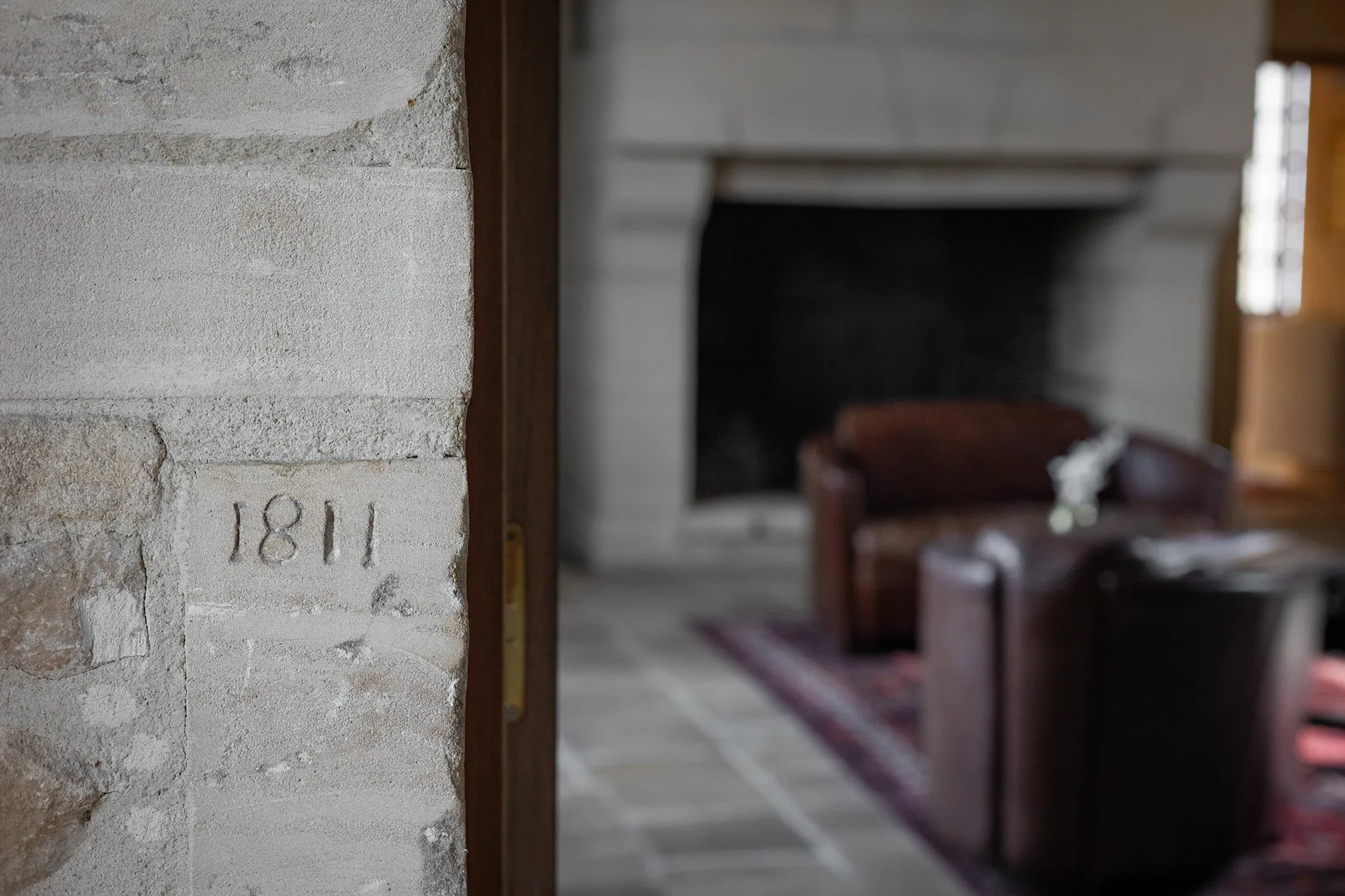 Ancient engraving on the wall of the reception of the Ranconniere farm