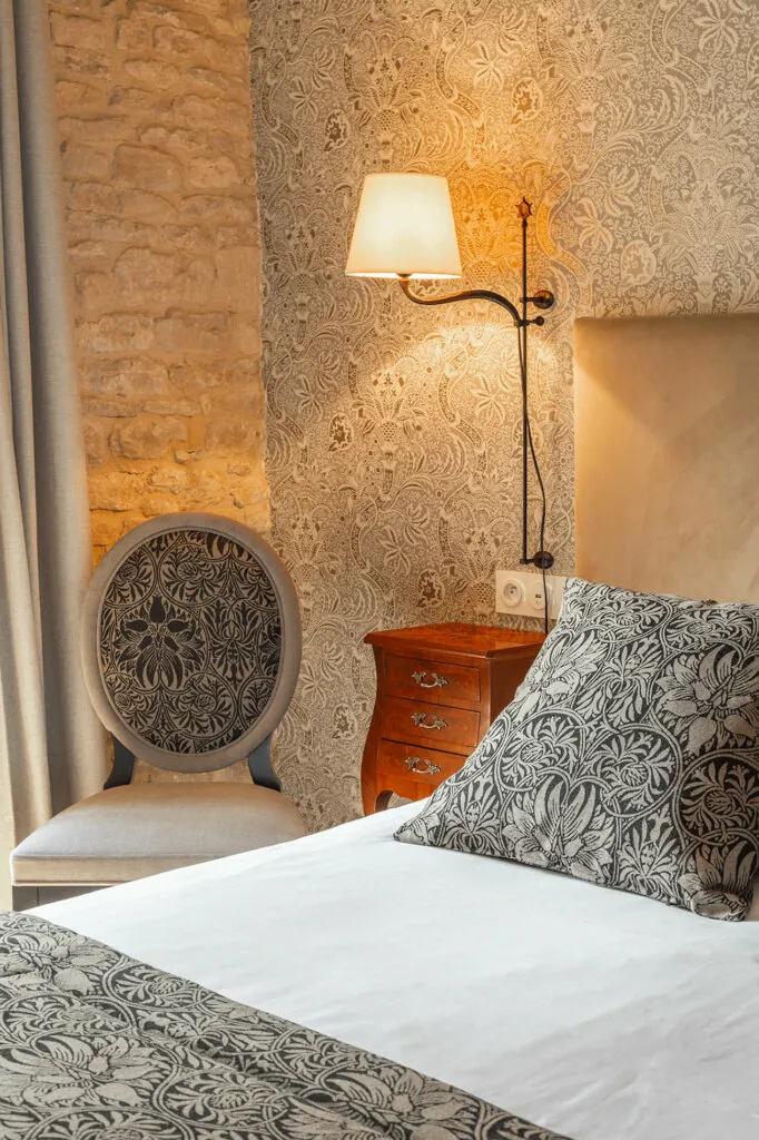 Charming room between stone and modern decoration ensuring an ideal stay at the Ferme de la Ranuniere hotel in Normandy